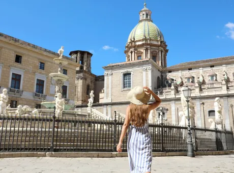 back view young beautiful woman walking near monumental praetorian fountain palermo italy 2