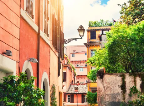 beautiful cozy street trastevere district rome italy old buildings with green trees morning sunlight travel vacation