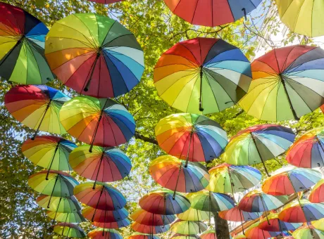 hanging rainbow umbrellas sky during gay pride marais district paris france