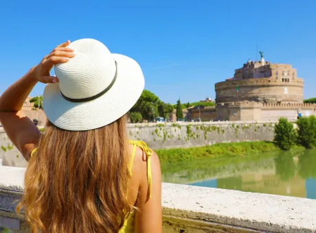 holidays italy back view beautiful tourist girl rome italy attractive fashion woman looks castel sant angelo castle bridge