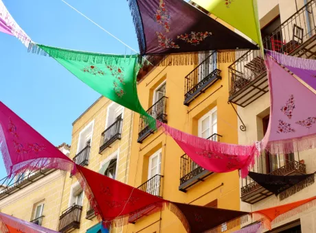 multicolored spanish shawls are strung balconies outside street decorated ambient creates festive mood la latina district madrid spain