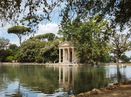 panoramic view temple asclepius tempio di esculapio lake public park villa borghese summer day blue sky 1