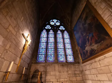 paris france december 31 2011 notre dame de paris cathedral interior panorama stainedglass windows pointed arches columns paintings walls