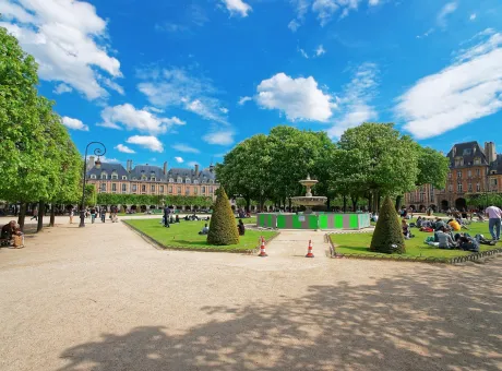 place des vosges beautiful park people sitting lawn central paris france