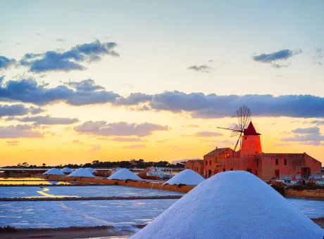 sunset windmill salt evoporation pond marsala sicily island italy