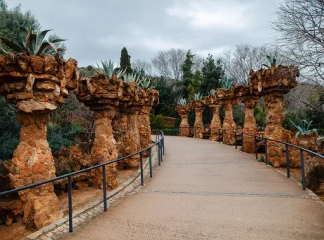 walking road through columns guell park barcelona