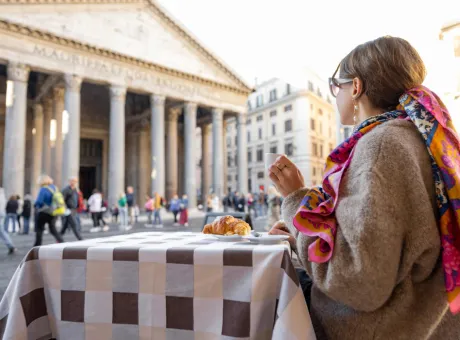 woman sitting outdoor cafe rome